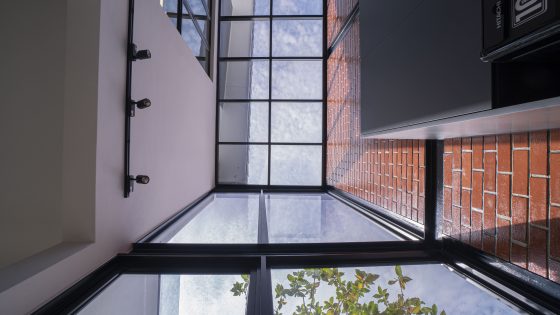 brick home brick house the brick house nu infinity design seed alex lee interior design industrial style architecture black furniture rustic skylight kitchen natural light