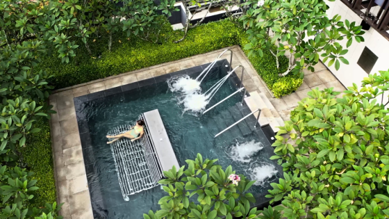EQ hotel Equatorial Hotel modern hotel Kuala Lumpur luxury hotel fancy hotel holiday hotel Malaysia EQ 5 star hotel five star hotel decoration art entrance lobby entrance luxury decoration green environmental friendly swimming pool pool facilities green plants tropical