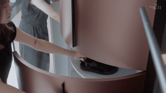 S/LAB 10 condominium modern luxury artistic art creative ventilation interior design decoration art decor high rise property foyer entrance artwork wood blue dark colours rounded cabinet cabinets shoe cabinets private foyer