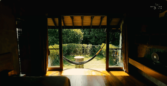 floating treehouse nature forest open to forest house eco friendly green family retreat forest view family home wooden design interior design architecture design seed inch lim inchscape elderly couple mature couple retirement home relax relaxing inch lim inchscape designer architect rubber estate forest jungle Malaysia woman looking at forest forest scenery nature beautiful homes green homes front door entrance pond asian house ceiling living room grey sofa low sofa wooden table wooden furniture wooden living room asian mature couple asian couple family home entrance wooden balcony forest view forest timber seats wooden materials wooden seats wooden design natural materials outdoors wooden timber materials wooden materials