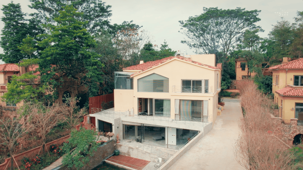 brutalist home china guangdong interior design office forest greenery glass box nature river design environments healing brutalist rough surfaces textures volume light xixi design consulting driveway pond renovation transformation basement living area slanted ceiling angular ceiling incense room driveway landscape fireplace cantilevered staircase chinese chinese designs window meditation room narrow staircase natural light ventilation sunroom alex lee design seed house home house tour family home