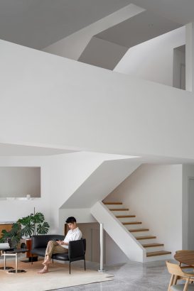 fabian tan design seed alex lee flovik house terrace house terrace house transformation malaysia extraordinary homes fabian tan architects architecture interior design split level home functionality minimalist minimal simple extension moving walls unique home unique walls layout kayout ideas home renovation home transformation house design house tour home tour connected space planning spatial flow living room koi pond landscaping lounge open spaces double volume moving panels light ventilation