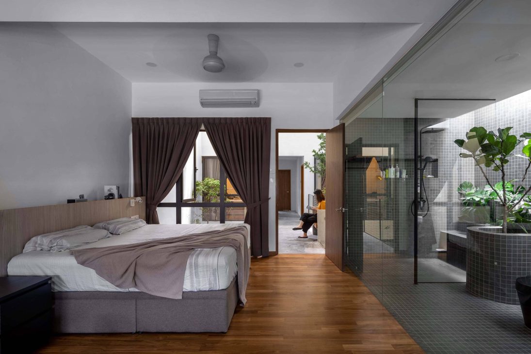 introverted house garden design seed alex lee tropical houses homes tour architecture architect O2CA Malaysian houses terrace houses terrace transformation small homes family bricks red extraordinary homes edric choo greenery link bridge double volume courtyard windows angled windows master bedroom bathroom design bathroom ideas master bathroom light bright ventilation layout reno renovation changes plans car porch secret garden hidden garden private garden living room open plan kitchen dining staircase planter box planter bridge green eco wing construction sanctuary oasis plants damansara perforated calming serene intimate homeowners shophouses polycarbonate roof tiles skylight