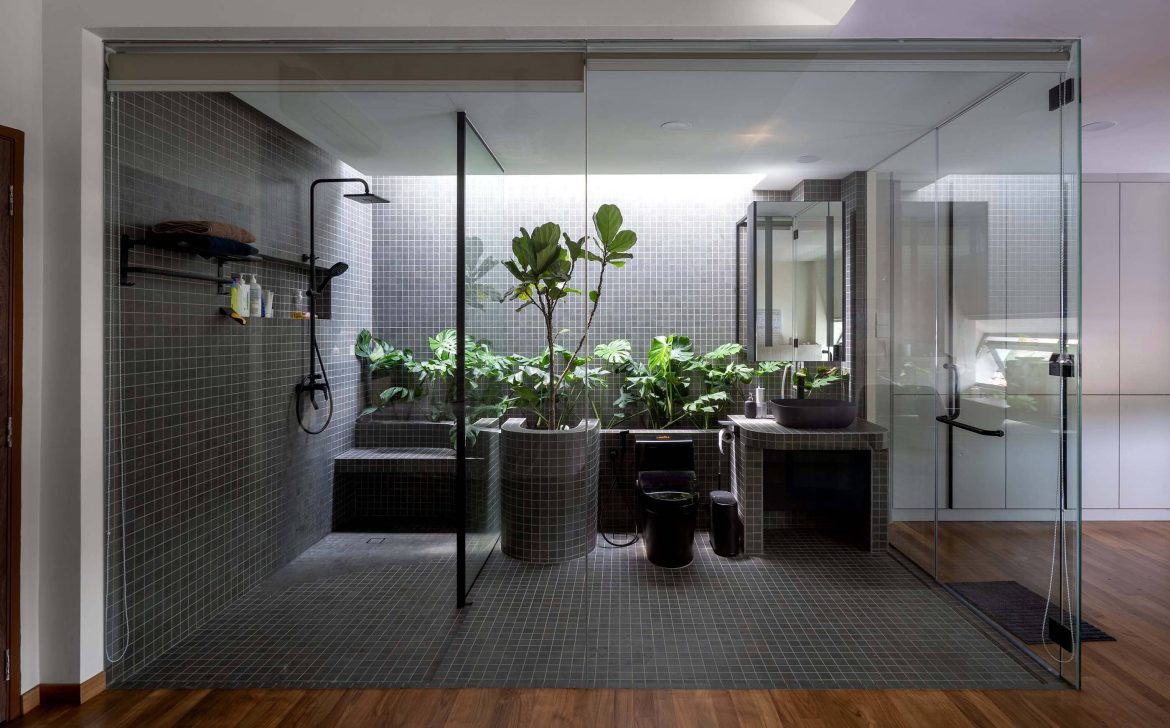 introverted house garden design seed alex lee tropical houses homes tour architecture architect O2CA Malaysian houses terrace houses terrace transformation small homes family bricks red extraordinary homes edric choo greenery link bridge double volume courtyard windows angled windows master bedroom bathroom design bathroom ideas master bathroom light bright ventilation layout reno renovation changes plans car porch secret garden hidden garden private garden living room open plan kitchen dining staircase planter box planter bridge green eco wing construction sanctuary oasis plants damansara perforated calming serene intimate homeowners shophouses polycarbonate roof tiles skylight