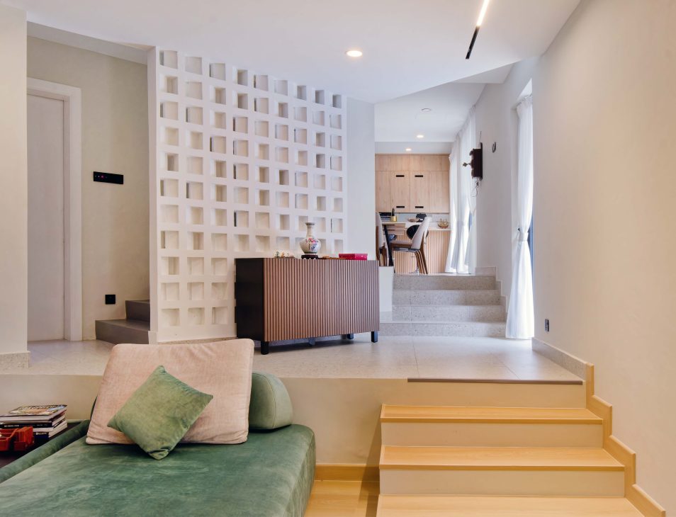 transformation house renovation changes renovation inspo urban garden house tropical concrete house architect architecture oscar tan showcase house tour home tour house inspo unique home climbing wall rock climbing split levels surprises cramped space spaces passions interests facade red facade colour red colour exterior stunning beautiful special aluminium panels heat tropical climate tropical house tropical living tropical design design ideas double skin layout plans passive cooling changes hobbies rock climbing skylight natural light tree indoor tree climbing feature compact house courtyard indoor courtyard vertical courtyard home elevator japanese rock garden serene living dining bedroom bathroom rooftop entertainment pool area sauna home sauna bathtub staircase unique stairs railing metal functional minimal perforated screen valve lounge deck