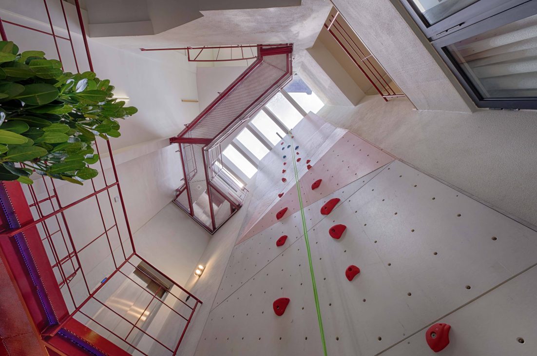 transformation house renovation changes renovation inspo urban garden house tropical concrete house architect architecture oscar tan showcase house tour home tour house inspo unique home climbing wall rock climbing split levels surprises cramped space spaces passions interests facade red facade colour red colour exterior stunning beautiful special aluminium panels heat tropical climate tropical house tropical living tropical design design ideas double skin layout plans passive cooling changes hobbies rock climbing skylight natural light tree indoor tree climbing feature compact house courtyard indoor courtyard vertical courtyard home elevator japanese rock garden serene living dining bedroom bathroom rooftop entertainment pool area sauna home sauna bathtub staircase unique stairs railing metal functional minimal perforated screen valve lounge deck