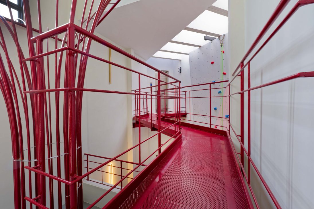 transformation house renovation changes renovation inspo urban garden house tropical concrete house architect architecture oscar tan showcase house tour home tour house inspo unique home climbing wall rock climbing split levels surprises cramped space spaces passions interests facade red facade colour red colour exterior stunning beautiful special aluminium panels heat tropical climate tropical house tropical living tropical design design ideas double skin layout plans passive cooling changes hobbies rock climbing skylight natural light tree indoor tree climbing feature compact house courtyard indoor courtyard vertical courtyard home elevator japanese rock garden serene living dining bedroom bathroom rooftop entertainment pool area sauna home sauna bathtub staircase unique stairs railing metal functional minimal perforated screen valve lounge deck