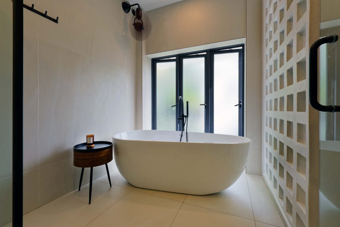 transformation house renovation changes renovation inspo urban garden house tropical concrete house architect architecture oscar tan showcase house tour home tour house inspo unique home climbing wall rock climbing split levels surprises cramped space spaces passions interests facade red facade colour red colour exterior stunning beautiful special aluminium panels heat tropical climate tropical house tropical living tropical design design ideas double skin layout plans passive cooling changes hobbies rock climbing skylight natural light tree indoor tree climbing feature compact house courtyard indoor courtyard vertical courtyard home elevator japanese rock garden serene living dining bedroom bathroom rooftop entertainment pool area sauna home sauna bathtub staircase unique stairs railing metal functional minimal perforated screen valve lounge deck