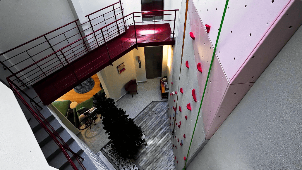 transformation house renovation changes renovation inspo urban garden house tropical concrete house architect architecture oscar tan showcase house tour home tour house inspo unique home climbing wall rock climbing split levels surprises cramped space spaces passions interests facade red facade colour red colour exterior stunning beautiful special aluminium panels heat tropical climate tropical house tropical living tropical design design ideas double skin layout plans passive cooling changes hobbies rock climbing skylight natural light tree indoor tree climbing feature compact house courtyard indoor courtyard vertical courtyard home elevator japanese rock garden serene living dining bedroom bathroom rooftop entertainment pool area sauna home sauna bathtub staircase unique stairs railing metal functional minimal perforated screen valve lounge deck