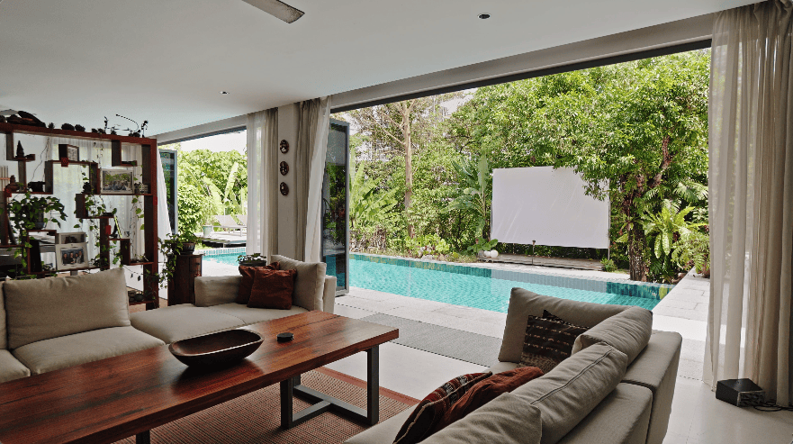 hidden forest home greenery jungle home house design seed martin haeger HL Design Group Bukit Antarabangsa Selangor Malaysia overgrown frameless glass doors sanctuary intimate nature outdoors privacy bungalow bungalow design layout blueprint plan unique unique homes family home swimming pool beach personal beach pavilion pond artist art paintings pottery architect architecture own home house tours calm biophilic design green granite waterfalls living room interior design transformation renovation guitar galvanized steel staircase open terrace sundeck tropical rain gutters overhanging roofs pitched roof double volume open jacuzzi master bedroom unique bathroom escape animals farm mini farm dogs cats chickens trees plants edibles outdoor jacuzzi outdoors cross ventilation loft bed art studio pottery room creativity entertainment space studio landscaping garden reserve forest natural ventilation sustainability space natural