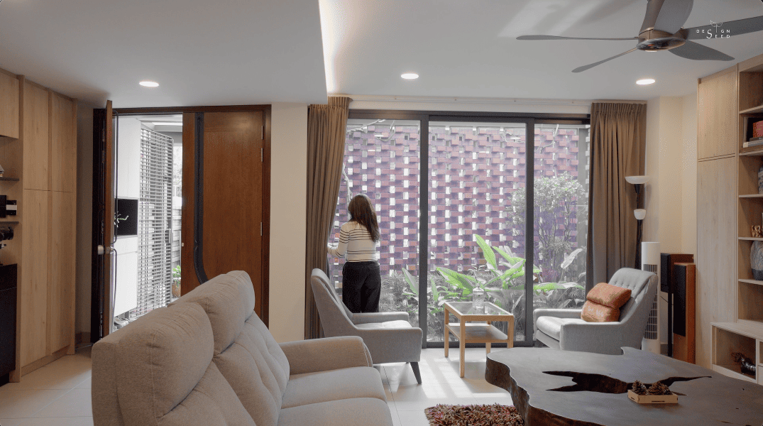 introverted house garden design seed alex lee tropical houses homes tour architecture architect O2CA Malaysian houses terrace houses terrace transformation small homes family bricks red extraordinary homes edric choo greenery link bridge double volume courtyard windows angled windows master bedroom bathroom design bathroom ideas master bathroom light bright ventilation layout reno renovation changes plans car porch secret garden hidden garden private garden living room open plan kitchen dining staircase planter box planter bridge green eco wing construction sanctuary oasis plants damansara perforated calming serene intimate homeowners shophouses polycarbonate roof tiles skylight