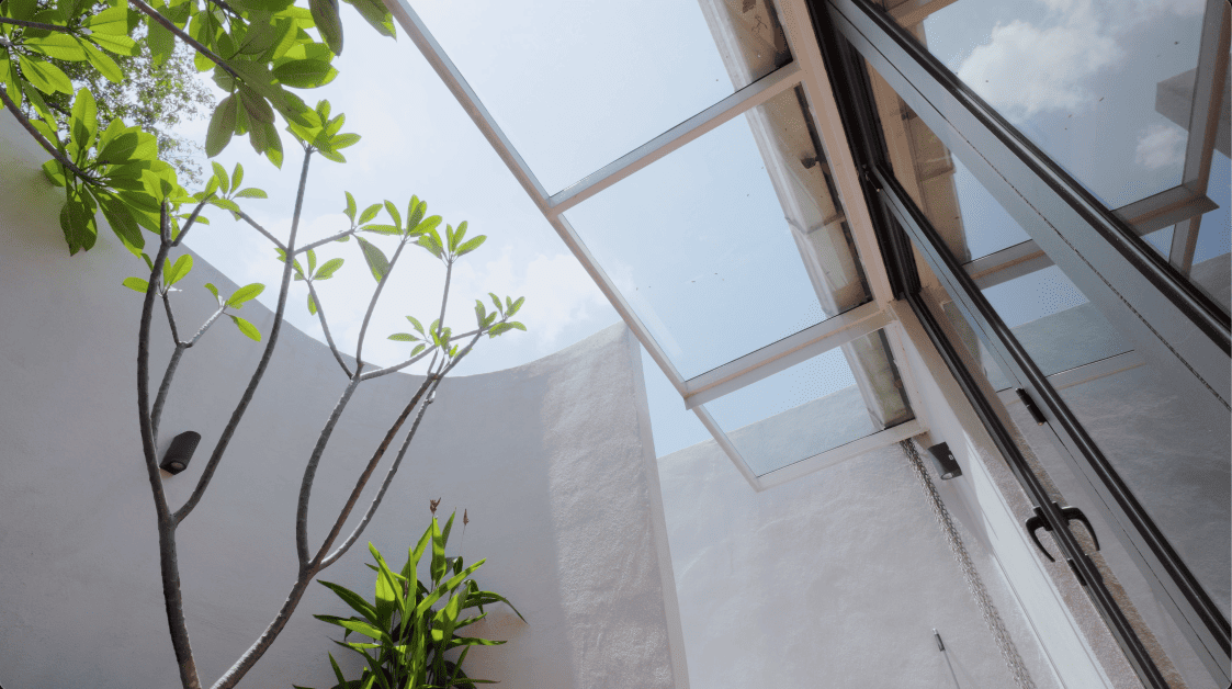 terrace house transformation design seed alex lee design interior design architecture architect Malaysia Malaysian houses terrace houses homes house tour family home winston paperspace two storey design kokun house project traffic privacy quiet highway wall noise barrier lifestyle old house renovation inspo ideas small home antique furniture laundry open plan diversity mixed family hidden room skylight louvre staircase light natural light daylight rooms study area master bedroom plants trees landscaping personal garden courtyard swimming pool tiles reflection calm resort feel facade curves kokun organic form concrete grasscrete sun direction grass terazzo red peranakan tiles floor plans layout unique stunning beautiful home modern homes challenges property