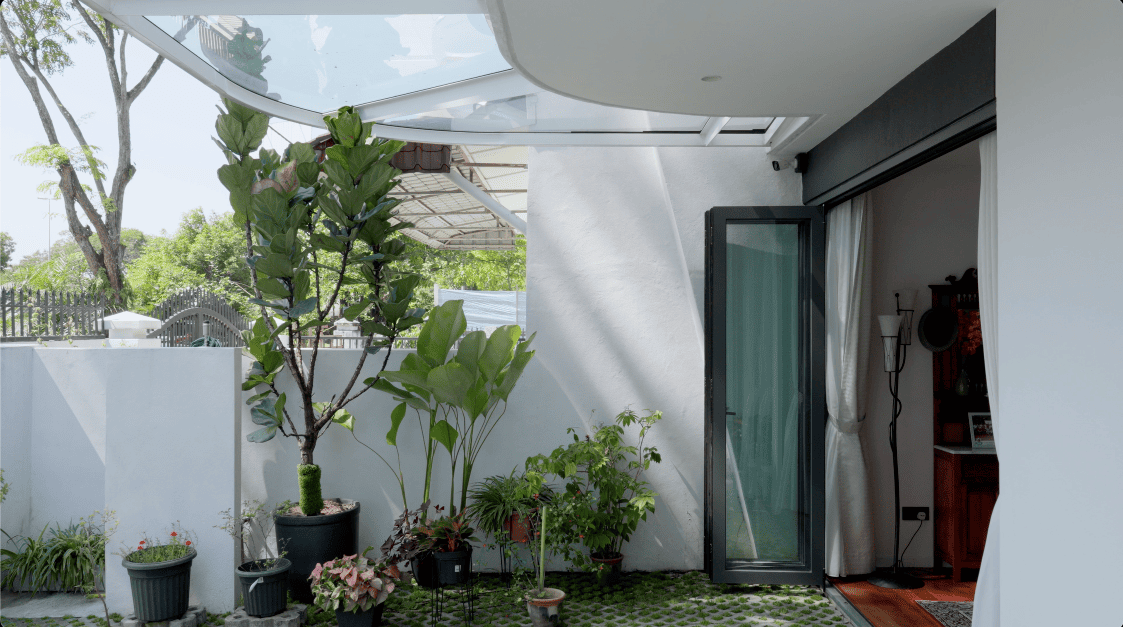 terrace house transformation design seed alex lee design interior design architecture architect Malaysia Malaysian houses terrace houses homes house tour family home winston paperspace two storey design kokun house project traffic privacy quiet highway wall noise barrier lifestyle old house renovation inspo ideas small home antique furniture laundry open plan diversity mixed family hidden room skylight louvre staircase light natural light daylight rooms study area master bedroom plants trees landscaping personal garden courtyard swimming pool tiles reflection calm resort feel facade curves kokun organic form concrete grasscrete sun direction grass terazzo red peranakan tiles floor plans layout unique stunning beautiful home modern homes challenges property