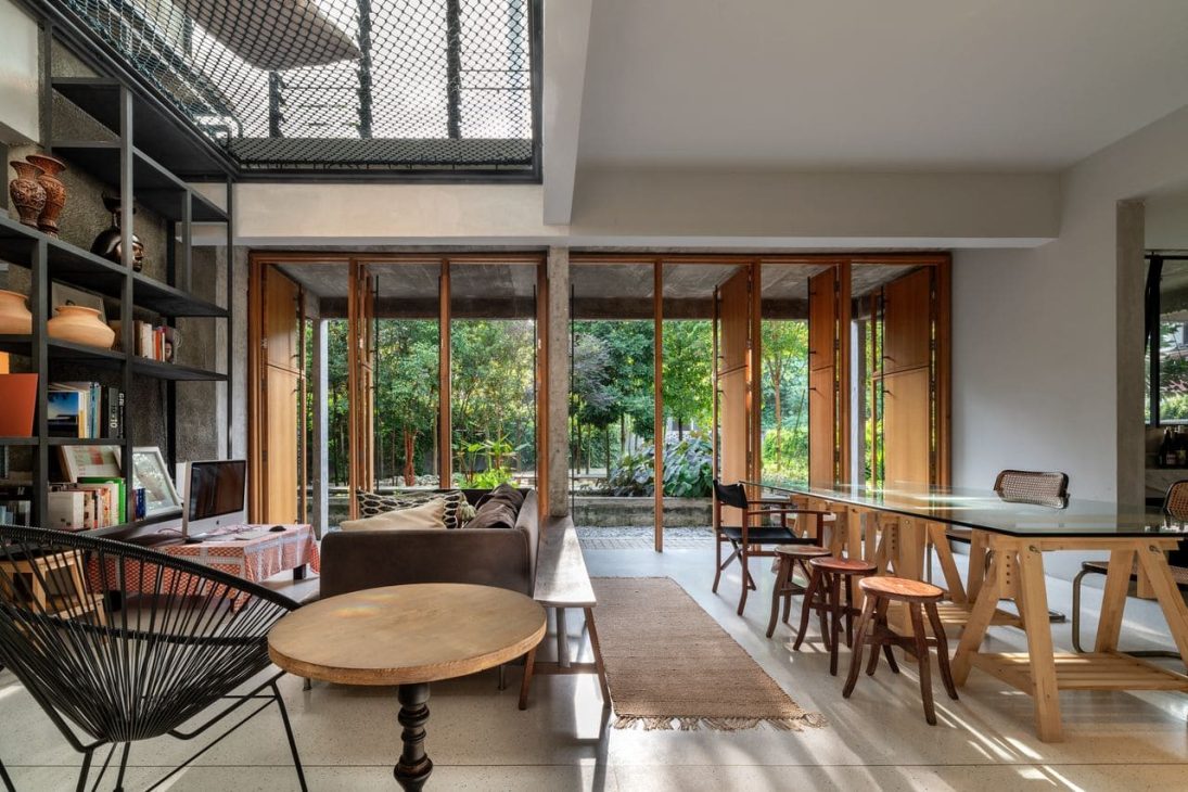 alex lee design seed tropical house transformation renovation construction landscape landscaping green greenery trees bungalow bungalow design mentahmatters design architect architecture urban city farm cheras lapan house shin chang neighbourhood facade trees ficus sandbrick walls layers fish pond garden privacy grid water feature pond fish pond grid canopy tall doors wood wooden doors foyer indoor outdoor divider workspace study materials honesty function steel structural slender durable low maintenance raw refined minimalist minimalism layout ideas interior design ideas craftsmanship two tier doors lower panel upper panel tropical house home house tour solid wood plywood living area double volume netting unique changes cantilevered kitchen area floor space open plan clarity experiment paulo mendes inspiration architectural build trees terazzo floor stainless steel ccountertop red brick kitchen industrial warm ventilation light natural light master bedroom unique beautiful eco friendly functional practical nature walk-in wardrobe cabinetry shared garden resources avocade garden farm community shared land extra land malaysia malaysian homes malaysian architecture