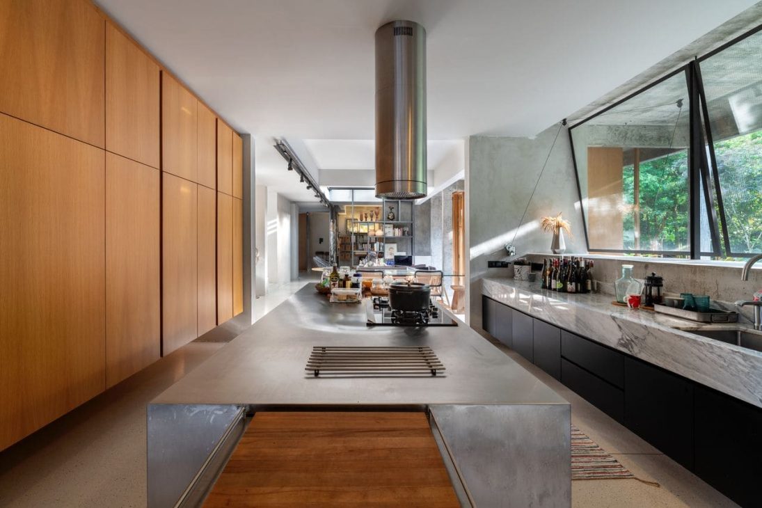 alex lee design seed tropical house transformation renovation construction landscape landscaping green greenery trees bungalow bungalow design mentahmatters design architect architecture urban city farm cheras lapan house shin chang neighbourhood facade trees ficus sandbrick walls layers fish pond garden privacy grid water feature pond fish pond grid canopy tall doors wood wooden doors foyer indoor outdoor divider workspace study materials honesty function steel structural slender durable low maintenance raw refined minimalist minimalism layout ideas interior design ideas craftsmanship two tier doors lower panel upper panel tropical house home house tour solid wood plywood living area double volume netting unique changes cantilevered kitchen area floor space open plan clarity experiment paulo mendes inspiration architectural build trees terazzo floor stainless steel ccountertop red brick kitchen industrial warm ventilation light natural light master bedroom unique beautiful eco friendly functional practical nature walk-in wardrobe cabinetry shared garden resources avocade garden farm community shared land extra land malaysia malaysian homes malaysian architecture