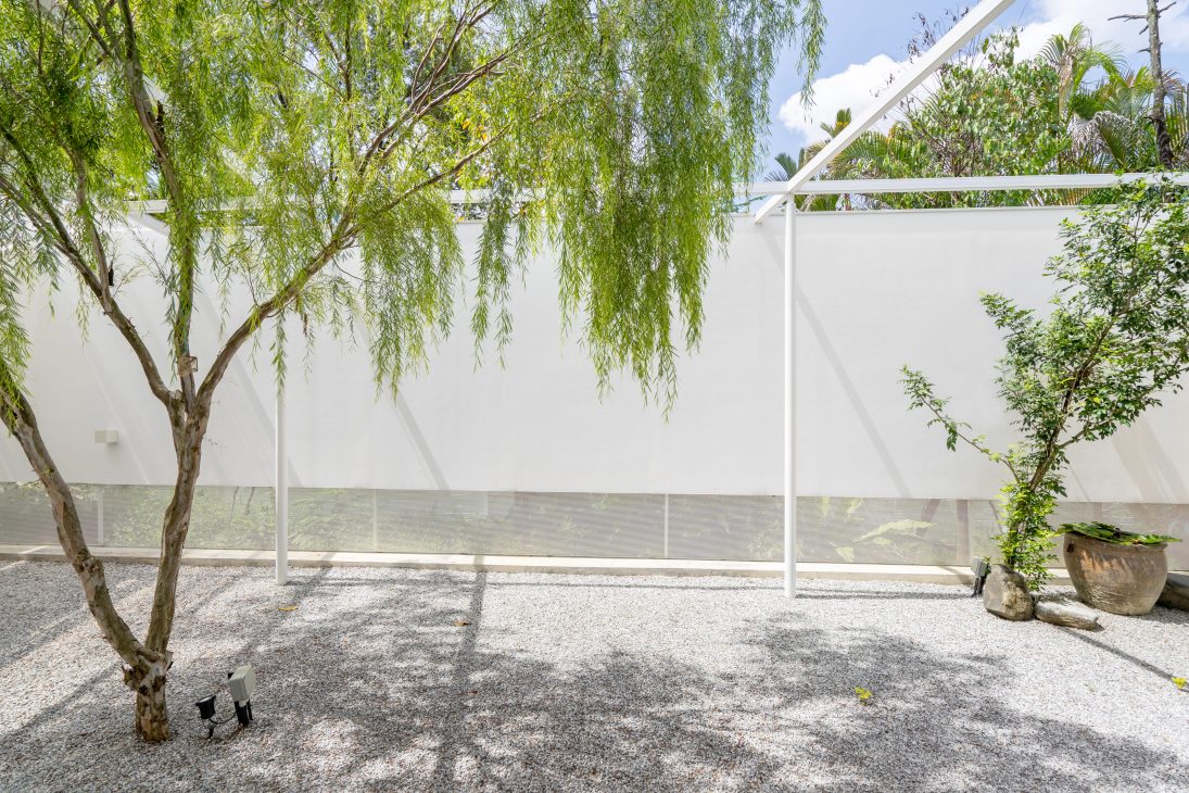 introvert introverse core design workshop design seed alex lee design interior design architecture house tour homes malaysia house transformation renovation ideas inspo outdoor hidden garden yellow art artist art gallery outdoor kitchen outdoor dining seamless nature greenery green trees ventilation open open toilet garden trees landscape living room double volume rooms bedroom design sunken room curtains minimalist minimalism simple beautiful stunning amazing