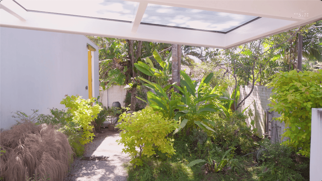 introvert introverse core design workshop design seed alex lee design interior design architecture house tour homes malaysia house transformation renovation ideas inspo outdoor hidden garden yellow art artist art gallery outdoor kitchen outdoor dining seamless nature greenery green trees ventilation open open toilet garden trees landscape living room double volume rooms bedroom design sunken room curtains minimalist minimalism simple beautiful stunning amazing