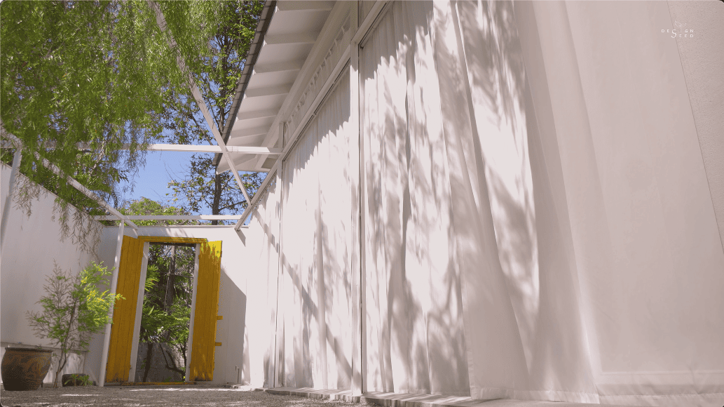 introvert introverse core design workshop design seed alex lee design interior design architecture house tour homes malaysia house transformation renovation ideas inspo outdoor hidden garden yellow art artist art gallery outdoor kitchen outdoor dining seamless nature greenery green trees ventilation open open toilet garden trees landscape living room double volume rooms bedroom design sunken room curtains minimalist minimalism simple beautiful stunning amazing