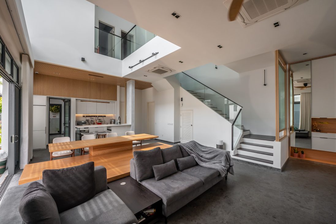 japan japanese japandi minimalist luxury house home family Nu Infinity Design seed Alex Lee interior design architecture house tour bungalow design garden greens greenery living room kitchen open plan open plan living and dining double volume smart home technology contemporary modern family kids friendly development malaysia design wooden wood platform multifunctional furniture bench table dining table entrance first floor study workspace kids