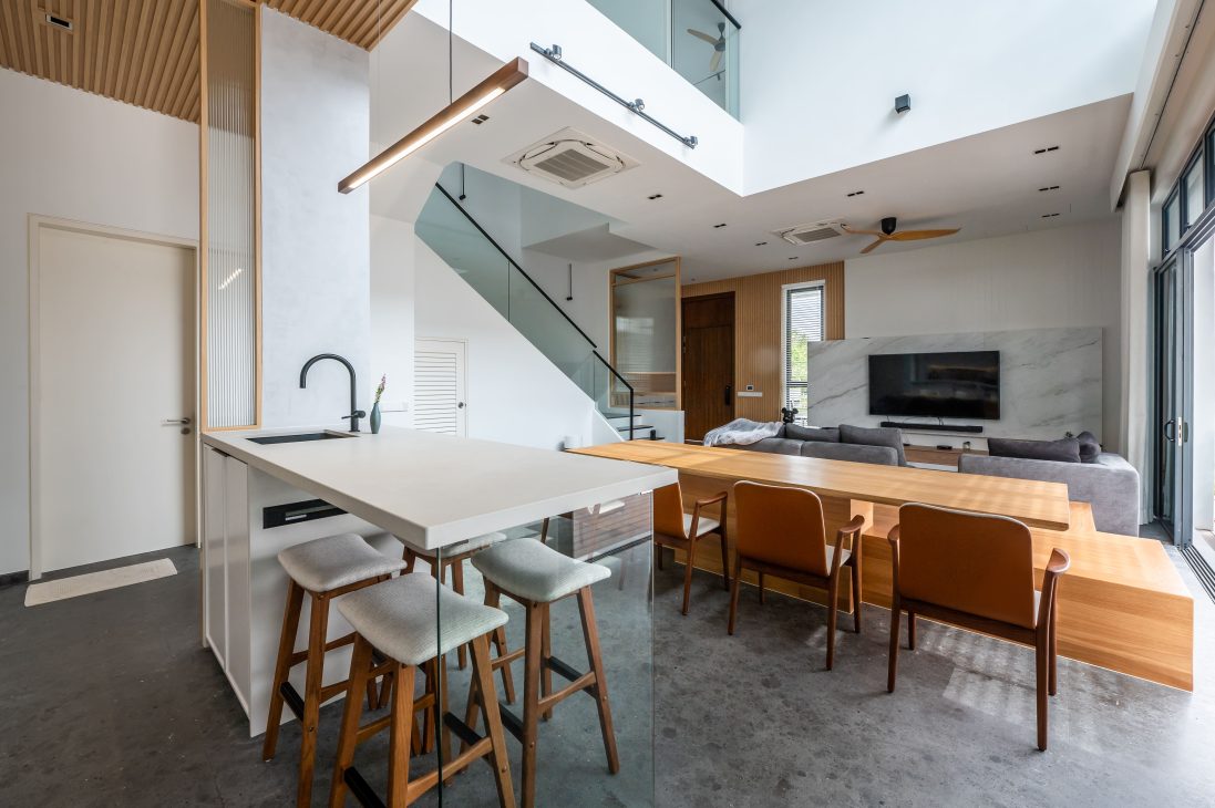 japan japanese japandi minimalist luxury house home family Nu Infinity Design seed Alex Lee interior design architecture house tour bungalow design garden greens greenery living room kitchen open plan open plan living and dining double volume smart home technology contemporary modern family kids friendly development malaysia design wooden wood platform multifunctional furniture bench table dining table entrance first floor study workspace kids