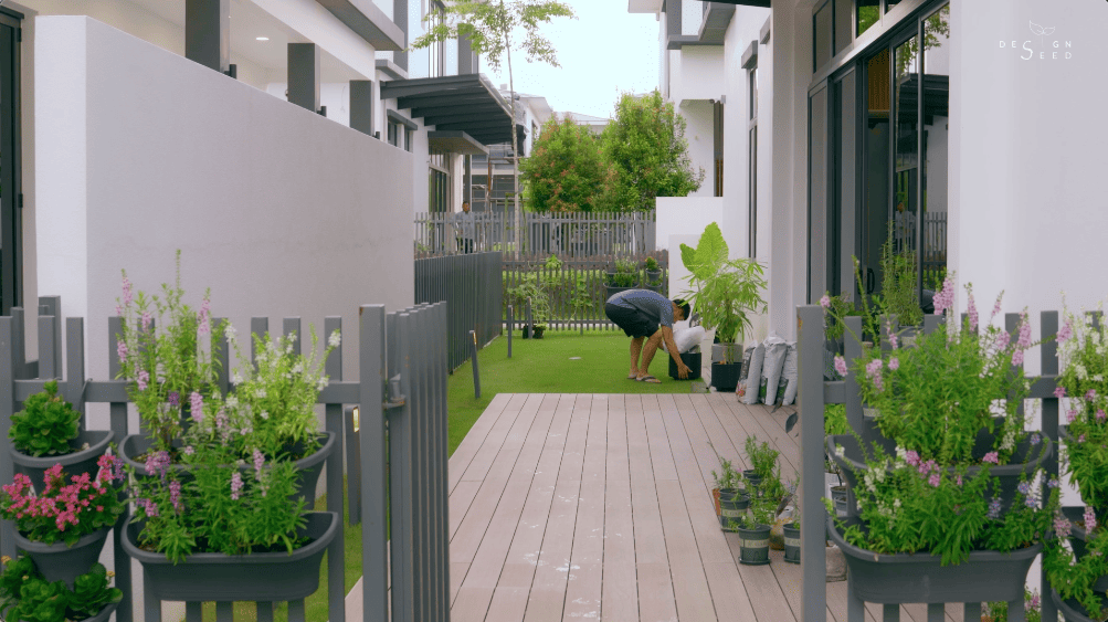 japan japanese japandi minimalist luxury house home family Nu Infinity Design seed Alex Lee interior design architecture house tour bungalow design garden greens greenery living room kitchen open plan open plan living and dining double volume smart home technology contemporary modern family kids friendly development malaysia design wooden wood platform multifunctional furniture bench table dining table entrance first floor study workspace kids