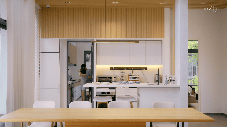 japan japanese japandi minimalist luxury house home family Nu Infinity Design seed Alex Lee interior design architecture house tour bungalow design garden greens greenery living room kitchen open plan open plan living and dining double volume smart home technology contemporary modern family kids friendly development malaysia design wooden wood platform multifunctional furniture bench table dining table entrance first floor study workspace kids