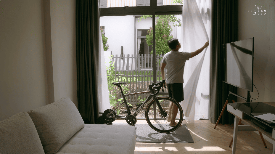 japan japanese japandi minimalist luxury house home family Nu Infinity Design seed Alex Lee interior design architecture house tour bungalow design garden greens greenery living room kitchen open plan open plan living and dining double volume smart home technology contemporary modern family kids friendly development malaysia design wooden wood platform multifunctional furniture bench table dining table entrance first floor study workspace kids