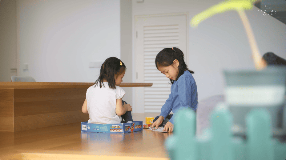 japan japanese japandi minimalist luxury house home family Nu Infinity Design seed Alex Lee interior design architecture house tour bungalow design garden greens greenery living room kitchen open plan open plan living and dining double volume smart home technology contemporary modern family kids friendly development malaysia design wooden wood platform multifunctional furniture bench table dining table entrance first floor study workspace kids