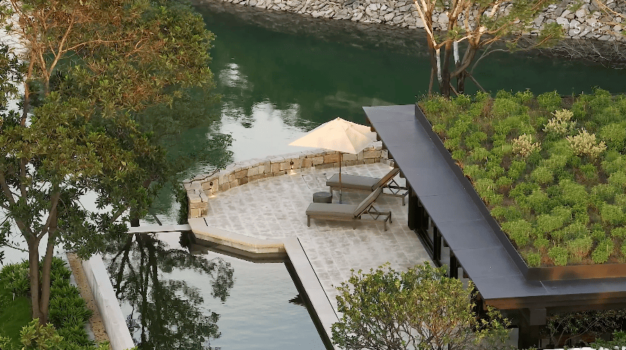 design seed alex lee mansion lakeside lake beautiful china aranya luxury villa nature mansion bungalow design interior design architecture homes house tour carenessland bedroom tea pavilion scenery landscape greenery tropical aranya holiday vacation ideas living room windows modern luxurious rich expensive design photography inspiration inspo living area double volume bedroom gym open plan garden light greenery