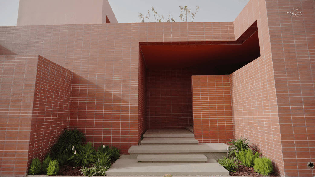 pink house country countryside mansion villa design interior design home family design seed alex lee china carenessland courtyard nature garden greenery WJID design china chinese design holiday retirement luxury modern brutalist red pink terracotta rural outdoors living room bedroom views windows