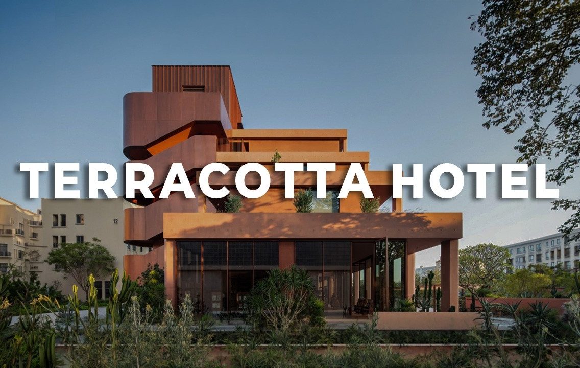 A Hotel Designed for Book Lovers | Red Concrete Facade | Interior Design & Architecture Ideas