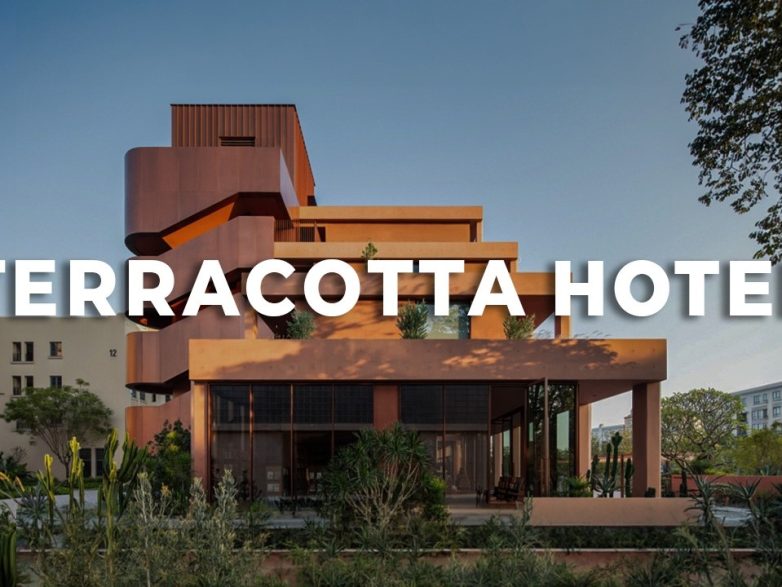 A Hotel Designed for Book Lovers | Red Concrete Facade | Interior Design & Architecture Ideas